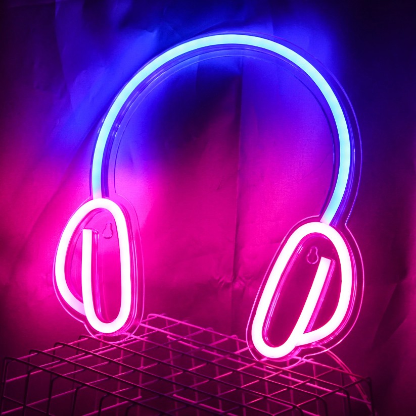 Auriculares: logotipo de letrero de neón LED iluminado colgado en la pared